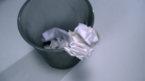 stock-footage-tossing-crushed-paper-into-garbage-can-shooting-with-high-speed-camera-phantom-flex