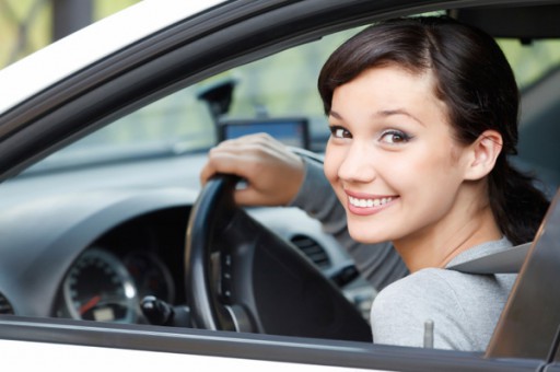 happy-young-girl-in-car