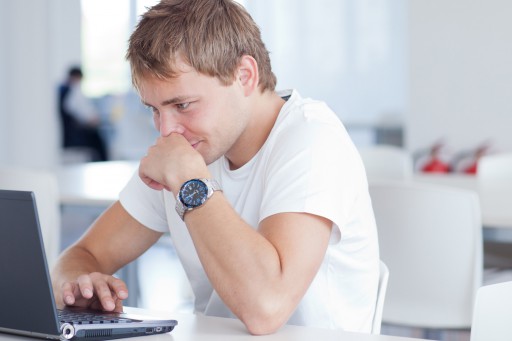 tense-man-looking-at-computer